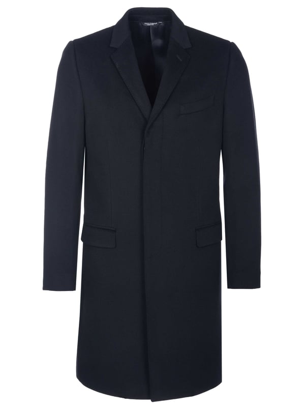 90% Schurwolle, 10% Kaschmir; Dolce & Gabbana Mantel;  Modell: G0926T FU3GT 15;  Hochwertig verarbeitet;  Weicher Baumwoll-Kaschmir-Mix;  Zwei Pattentaschen vorne, eine Brusttasche;  Vier Innentaschen;  Gehschlitz hinten;  Reverskragen;  Verdeckte Knopfleiste mit drei Knöpfen