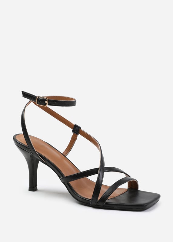 Wheres That From Womens 'Austin' Multi Strap Cross Over Mid Heels Step out in style and sophistication with our Austin Wide Fit Multi Strap Cross Over Mid Heels. These stunning heels are designed to elevate your outfit and add a touch of glamour to your every step.
Key Features:
Strappy Design: The multi-strap detail adds an elegant and polished touch to these shoes, making them the perfect option for those who want to make a fashion statement.
Comfortable Height: The mid-high heel provides stability and support, while the cushioned insole ensures all-day comfort. Walk confidently knowing that your feet will stay comfortable, no matter where the day takes you.
Open Toe: Open toe design adds a chic and fashionable element to these high heels, showcasing your pedicure and adding sophistication to any outfit.
Specifications:
Material: Faux Leather
Heel Height: 2’ (5.08cm) approx
Strap Detail: Multi-strap design adds elegance and polish to these shoes
Closure: Buckle closure for a secure and adjustable fit
Elevate your style and make a statement with our Austin Wide Fit Multi Strap Cross Over Mid Heels. These shoes combine fashion and functionality, allowing you to showcase your individuality while enjoying all-day comfort. Step out with confidence and embrace your inner trendsetter.