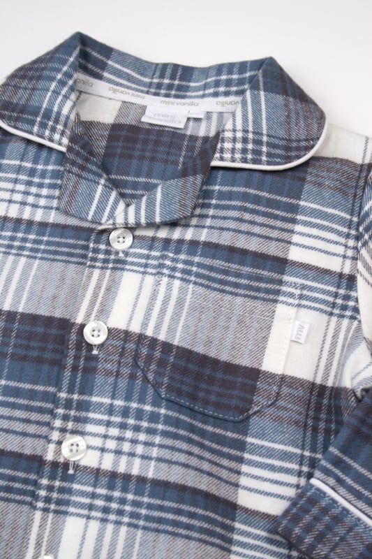 Give your little one a cosy, stylish sleep with our Boys' Traditional Check Cotton Pyjama Set, crafted for comfort and classic appeal. Featuring a timeless checkered pattern, this two-piece pyjama set includes a button-up top with a relaxed fit and elastic-waist bottoms, ensuring easy movement and a snug fit. Made from soft, breathable cotton fabric,  these PJs are designed to keep your child comfortable through every season.
Ideal for parents seeking classic boys' sleepwear or a check pyjama set, this outfit combines heritage charm with modern ease. Perfect for bedtime, lounging, or even as a thoughtful gift, this boys' check PJ set offers durability, comfort, and style in one package.