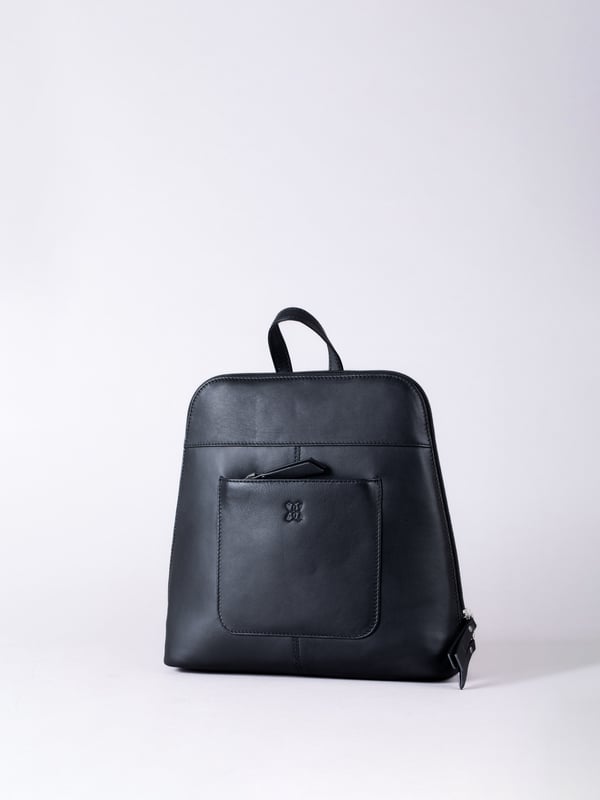 The Talkin handbag collection is a study in sleek sophistication, and this practical backpack is no exception. Crafted from soft premium leather, this classic design has plenty of space to ensure you can carry all your essentials with ease. The adjustable leather straps offer unparalleled comfort, and we've included a grab handle for convenient carrying.