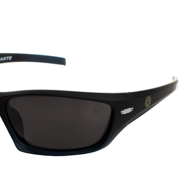 Must Have Police Sport Sunglasses with wraparound design, ideal for outdoor activities requiring complete protection and a secure fit.

 Made of polycarbonate, they offer lightness and durability, perfect for prolonged use.

 Equipped with UV 400 protection polarized lenses, they block 100% of UVA and UVB rays, reducing glare and providing clear vision in sunny environments.

 They include an adjustable band on the back with the inscription "Policía Local Alicante," ensuring that the glasses stay firm even during intense movements.

 Plus, they come with a cloth case to protect them when not in use.

 These glasses are ideal for security forces or for sports activities, providing comfort, protection and stability in any situation.
 Measures: Lens height: 44 mm, Lens width: 66 mm, Bridge: 10 mm, Temples: 110 mm
 Composition: Polycarbonate
 Care:
- Wash only with water or, if necessary, a mild soap.
 - Dry with a soft cloth to avoid scratches.
 - Avoid contact with harsh surfaces or abrasive liquids.