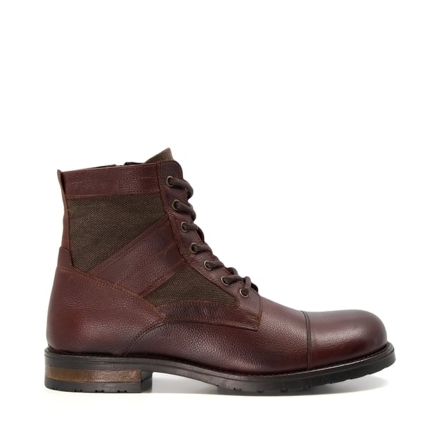 Dune Mens Cornered - Casual Leather Lace-Up Boots Meticulously crafted with smooth premium leather, our casual Cornered boots will infuse a touch of luxury into your everyday wardrobe. Set on a sturdy flat sole, the lace-up front is accentuated with metal eyelets for a refined finish. Cut for a neat round toe, the textural base has been overlayed with intricately cut-out details that effortlessly update the style.