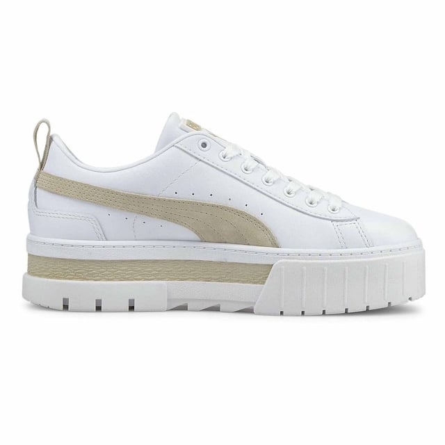 PRODUCT STORY : We made this one for the hype girls, street enthusiasts and trend mavens - basically for those who want to stand out with sophisticated swagger. Taking design elements from the urban environment and injecting them with extra edge, the Mayze encompasses attitude. Crisp and clean, with a luxurious leather upper, sleek suede overlays, eye-catching colour contrasting and a seriously stacked sole, these trend-setting trainers will be the envy of every onlooker. DETAILS : Leather upper with suede and synthetic overlays Glossy eyelets Elevated rubber midsole with textured tooling Rubber outsole Lace closure for a snug fit PUMA branding at tongue Foil-printed PUMA No.2 Logo at quarter PUMA Formstrip at medial and lateral sides PUMA Wordmark at tooling Foil-printed PUMA Cat Logo at heel