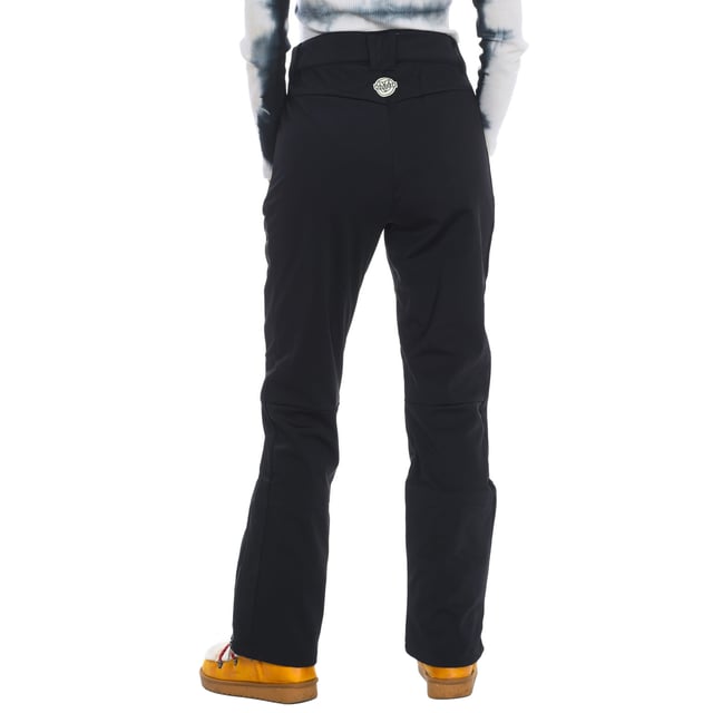 Ski pants Vuarnet.
 Front opening with zipper and snap button.
 Two zippered hand pockets
 Adjustable lower leg with zipper.
 Fixed inner gaiter with non-slip bands and reinforced material on the leg.
 Brand logo on the back.
 Seams seen in tone.
 Composition: 76% Polyamide, 24% Elastane
 Care:
Handwash.
 Do not use dryer.
 Do not iron.
 Do not use bleach.
 Do not dry clean.