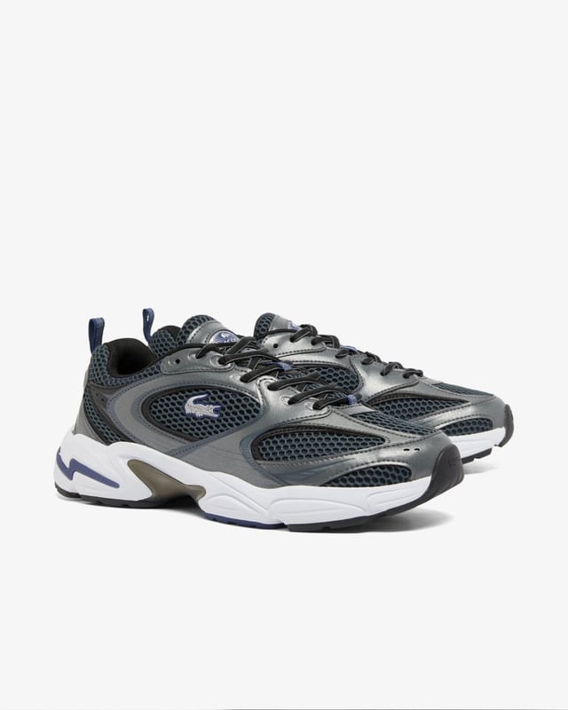 Lacoste Mens Storm 96 2K Trainers The Storm 96 2K is a creative re-imagining of the Velocity 96, Lacoste’s very first running shoe, blending 2000s running designs with modern, lifestyle-centered features. With dynamic lines and bold choices of materials, including metallic elements to create a striking style.
Mesh and synthetic leather upper
TPU plate and inserts in midsole for improved support
EVA midsole for comfort and cushioning
Textured, robust, high-grip rubber outsole
Signature crocodile on center panel, heel and tongue
Upper: 59% Polyester 41% Polyurethane; Lining: 100% Recycled Polyester; Insole: 100% Polyester; Outsole: 48% EVA 43% Rubber 9% Thermoplastic Polyurethane
48SMA0071