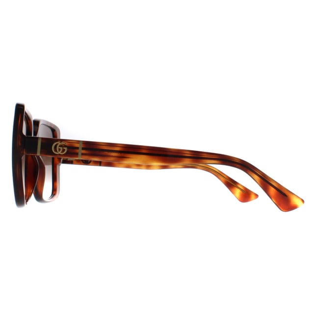 Gucci Square Womens Dark Havana Brown Gradient GG0632S  Sunglasses are a modern square frame that effortlessly complements any outfit. The frame is made from high-quality acetate, renowned for its durability and lightweight nature, ensuring a comfortable fit. Gucci's logo features on the slender temples for brand authenticity.