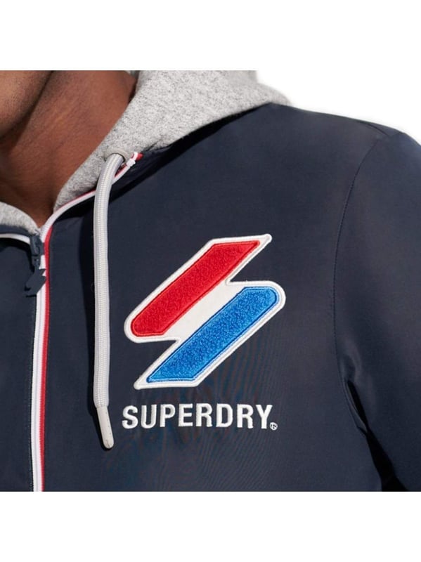 Veste Superdry Style Track Herren Blau Synthetik. Authentisches Kleidungsstück der Marke Superdry - Streetwear/Sportswear-Design von Superdry - Superdry für Herren, perfekt für den Alltag - Die blaue Superdry-Jacke lässt sich hervorragend mit dem Rest Ihrer Garderobe kombinieren - bequeme Synthetikmaterialien - klassisch - Style Track -