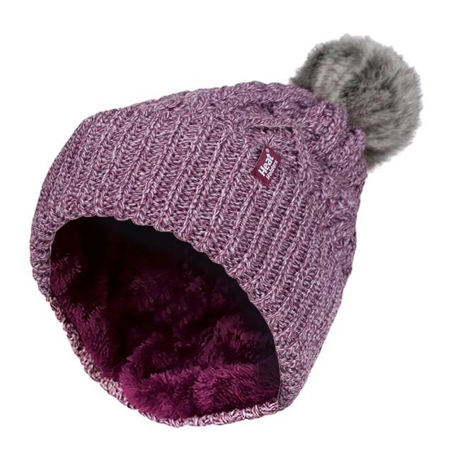 Like the original Heat Holders ladies pom pom but with a modern styled knit, this Solna styled hat like the original aims to keep you cosy and warm whilst keeping you fashionable with their contemporary style and knit. These womens pom pom hats have a fleece plush insulation lining, called Heatweaver, that is even more effective at holding warm air than any regular lining. This thermal lining is designed to be soft with a luxurious fleece feel (it almost feels like your touching the golden fleece) whilst holding warm air close to your skin, effectively keeping the cold air out. All of this is designed to ensure that you are toasty warm throughout the cold weather. This pom pom hat has a turn over cuff and a large faux fur fluffy pom pom on the top of the hat. This hat has a cable knit construction on its outer to give a fashionable touch. These ladies Solna hats are also to be considered the most slouch like out of all of Heat Holders’ range of thermal hats. These ladies Heat Holders Solna styled pom pom hats are available in 7 colours including cream, denim and light grey. They are made from 55% Polyester, 45% Acrylic on the outside of the hat and the lining is made from 100% Polyester. They come in one size and they are machine washable.