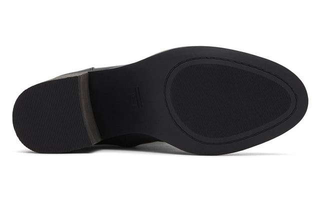 The Evelyn Casual Block Heel Boot is the perfect blend of comfort and style, designed for versatility. Crafted with leather uppers and a medial side zip, this boot offers easy wearability and a sleek silhouette. The asymmetric toe detail adds a touch of sophistication, while the high-rebound OrthoLite Eco X40 Hybrid insoles provide eco-friendly cushioning with 32% recycled content. Featuring a stacked leather-wrapped block heel and durable TPR outsole with TPU toplift, the Evelyn boot is ideal for both work and play.- Leather uppe- Side zip closure- Rised heel - Cushioned footbed- Durable outsole- Toms branding