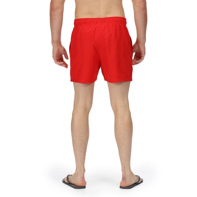 100% Polyester. Voering: Gaas. Stof: Microvezel. Ontwerp: Logo, eenvoudig. Zakken: 2 Zijzakken, 1 Achterzak. Bevestiging: Pull-On. Stoftechnologie: slijtvast, sneldrogend. Taille: Koord, Elastisch. Duurzaamheid: Gemaakt van gerecycled materiaal.
