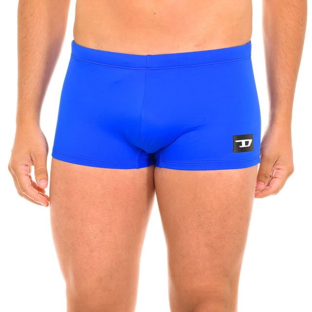 Boxer swimsuit. 
 Color blue 
 Elasticated waistband, adjustable with laces. 
 Brand print on the lower side. 
 Inner lining. 
 Seams in tone. 

 Composition: 
 - 78% Nylon - 22% Elastane. 

 Washing instructions: 
 - Wash at max. 30º. 
 - Do not use bleach. 
 - Allows dry cleaning. 
 - Do not iron. 
 - Do not use dryer. 

 Composition: 78% Nylon, 22% Elastane
 Care:
- Wash at max temperature. 30º.
 - Do not use bleach.
 - Allows dry cleaning.
 - Do not iron.
 - Do not use dryer.