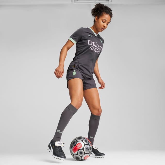 PUMA Womens AC Milan 24/25 Third Jersey PRODUCT STORY: In the 24/25 Third Kit, a neutral base color lights up in bold accents including monochromatic version of the club crest to express the inherent Milanese style in a way thats both new and distinctly Rossonero, even in the absence of Rosso or Nero. Welcome to Milan(ismo). FEATURES & BENEFITS: dryCELL: Performance technology designed to wick moisture from the body and keep you free of sweat during exercise; As part of the RE:FIBRE program, this garment is made of at least 95% recycled material from textile waste and other used materials. DETAILS: Regular fit; 170 gsm, Jacquard; Crew neck; Short sleeves; Official team branding. Our model is 174 cm tall and is wearing size S UK.