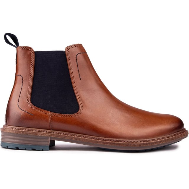 The Classic Justin Chelsea Boot From Hush Puppies Is A Dapper Versatile Staple For Your Sleek Everyday Wear Or An Evening Out In Town. The Men's Ankle Boot Boasts Soft And Cosy Microfibre Lining In Combination With Elastic Side Gussets And Smooth, Polished Leather Upper For Comfort And Style.