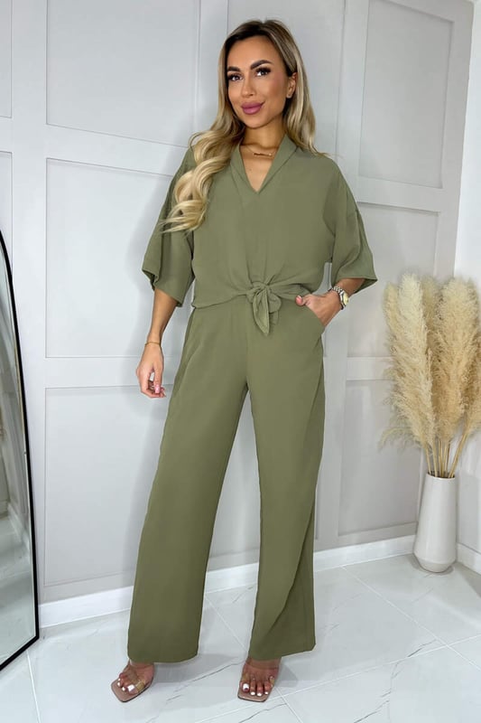 This Khaki V-Neck Collar Tie Front Shirt, is so cute for a relaxed fit
day time look with some jeans and sandals. For a more dressed up look
pair with some statement earrings, black leathers and heels ready for
a glam night out.

Model wears: UK 8/ EU 36/ US 4
Model's height: 165cm/ 5'5"
Approx length from centre back to hem: 56cm
Fabric composition: 100% Polyester
Colour: KHAKI

*print position may vary*