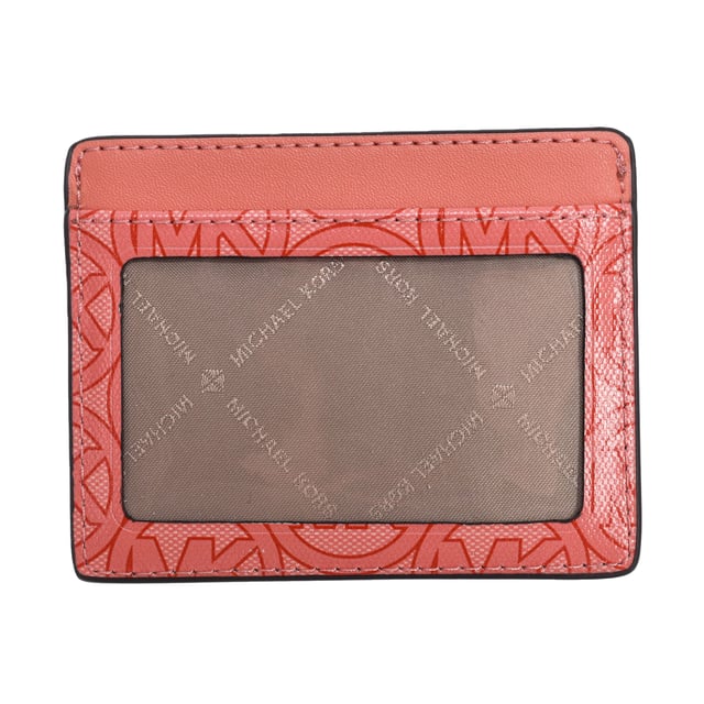Tarjetero Michael Kors.
Forma rectangular.
Compartimentos para tarjetas o billetes plegados.
Ventana de identificación transparente.
Forro interior con estampado del nombre de la firma consecutivamente.
Costuras vistas a tono.
Aplicación del nombre de la marca.
Fabricado con cuidado y detalle, este tarjetero es el accesorio perfecto para cualquier mujer."
 Medidas: 10 cm (anch.) x 8 cm (alt.)
 Composición: 100% Cuero
 Cuidados:
Limpiar con un paño húmedo.