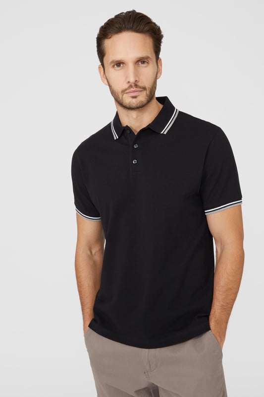 Introducing our Pique Tipped Polo, the perfect addition to any man's smart casual wardrobe. Crafted with meticulous attention to detail, this polo offers a sophisticated and polished look. The pique fabric provides a comfortable and breathable feel, making it ideal for all-day wear. With its stylish tipped collar and cuffs, this polo adds a touch of elegance to any outfit. Whether you're heading to the office or out for a casual gathering, our Pique Tipped Polo is the ultimate choice for a smart and effortlessly stylish look.