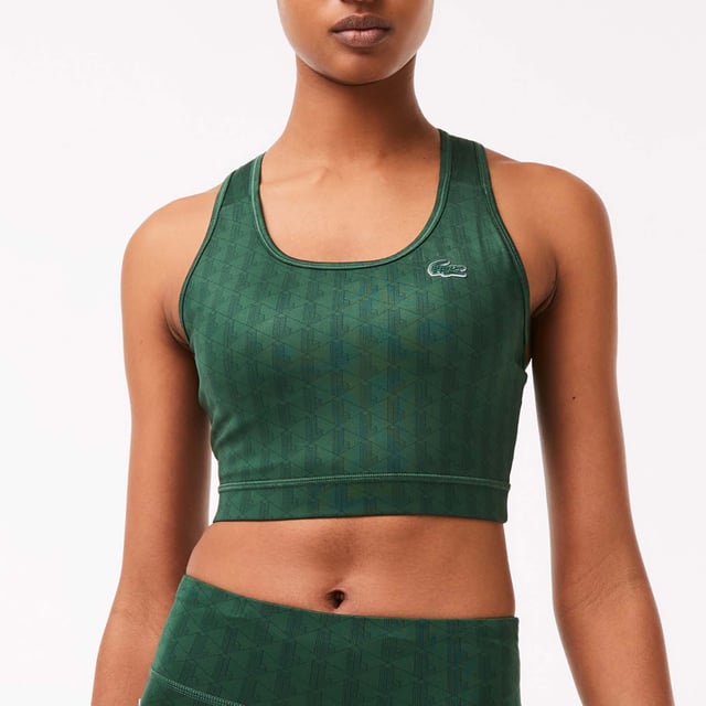 Women's Lacoste SPORT Printed Sports Bra.- Tight fit, very adjusted cut: Highlights your silhouette.- Removable cookies: For extra support. Flat seams: Prevents rubbing and irritation.- Silicone crocodile sewn onto front: Lacoste squared.- Recycled polyester: High-tech and environmentally-friendly. Material: 77% Polyester, 23% Elastane. Ref: TF3422D1R.
