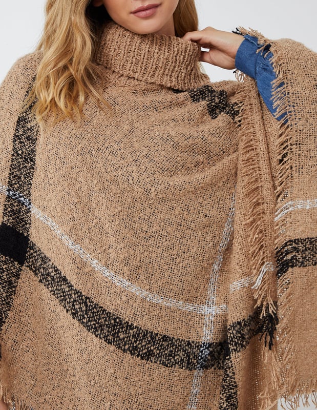 Keep warm in this season with our roll neck poncho. Soft fabrics and oversized style will going to help you keep this winter warm and cosy. Match with pair of jeans and sneakers for casual look.
100% Polyester Machine washable Roll neck  Approx length 60 cm  UnfastenedThis item is a ONE size that fits UK 8-14