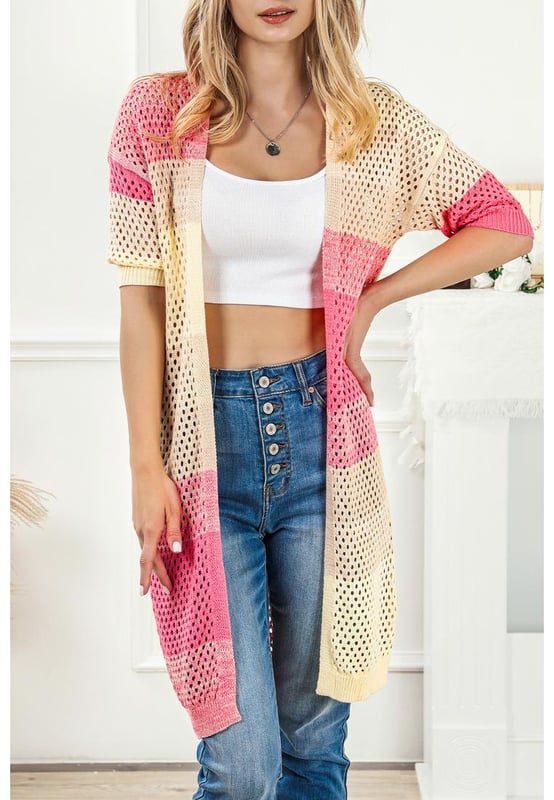 Luxurious Ribbed Short Sleeve Ombre Eyelet Knitted Cardigan
  Designed for women
  Quality materials
  Stylish ribbed texture
  Modern short sleeves
  Eye-catching ombre eyelet design
  Versatile addition to your wardrobe