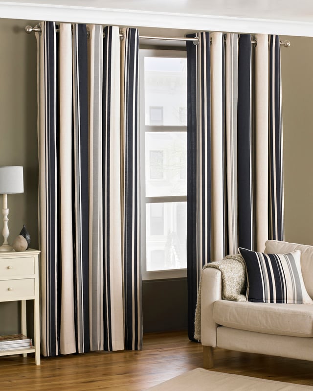 A wonderful and well co-ordinated stripe design allows the Broadway lined eyelet curtains to provide a touch of contemporary appeal to any room. Fully lined and crafted from cotton rich material, the Broadway curtains create a tastefully stylish atmosphere, along with an eyelet ring top heading for that extra modern touch. Made of polycotton these curtains are incredibly soft making them fall effortlessly while also able to withstand the everyday wear and tear of a hectic household. These curtains feature stainless steel eyeless holes for easy installation with no need for hooks or rings - you need only supply the curtain pole. As these curtains are a delicate addition to your home they will need extra care and are therefore dry clean only, however can still be ironed.
