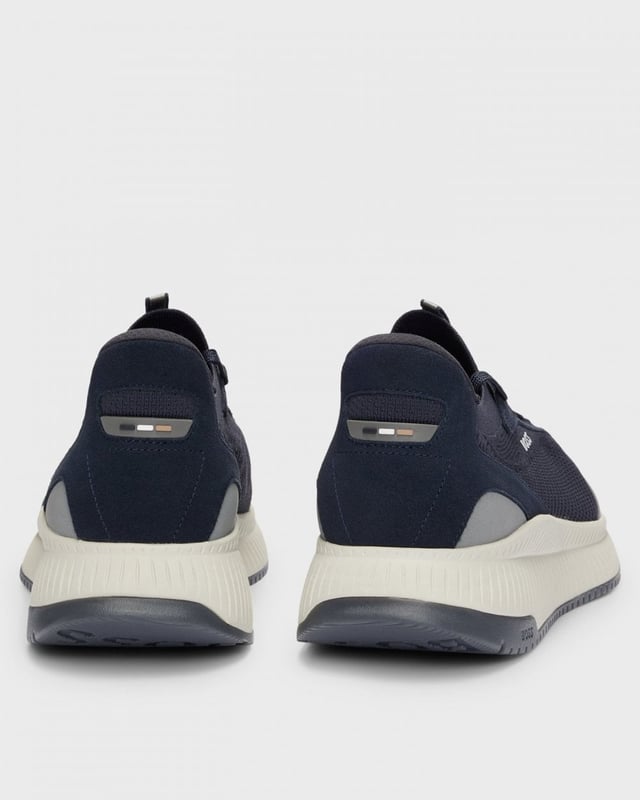 Expertly crafted with a ridged outsole for a sportive profile, these trainers are designed in a combination of materials including smooth leather. Signature detailing appears throughout for a distinctive touch.

Laces
Partially lined
Packaging: Box

85% Polyester (recycled) , 15% Polyester, 100% Polyester, 85% Polyester, 15% Polyurethane, Sole: 70% Ethylene vinyl acetate, 30% Rubber, Facing: 100% Thermoplastic polyurethane, 100% Cow skin, Upper material: 85% Polyester (recycled), 15% Polyester, Innersole: 100% Polyester
 
50523113
 