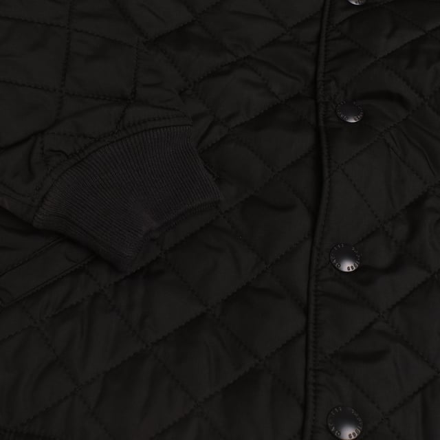 Unisex jacket for children in collaboration with Disney, with charming decorative quilting that adds style and warmth.

 It features a snap front closure for ease of use and a high, stretch-knit collar that offers additional protection in cold weather.

 The detachable hood with fun ears adds a playful and practical touch, allowing for styling options.

 Ribbed sleeves ensure a comfortable fit, and the straight cut provides freedom of movement.

 Plus, it features functional slanted pockets, making it an ideal garment for both everyday use and for keeping little ones warm and comfortable.
 Composition: Shell: 100% Polyester; Lining: Acrylic; Filling: 100% Polyester
 Care:
- Machine wash cold on delicate cycle.
 - Use mild detergents.
 - Use dryer at low temperature.
 - Iron at low temperatures.
 - Do not dry clean.