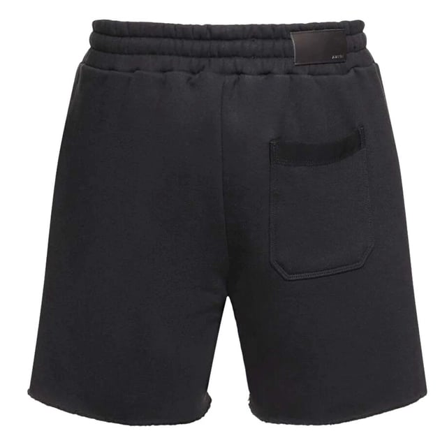 Amiri MA Logo Black Sweatshorts. Amiri Black Sweatshorts. 100% Cotton Shorts, Branded Side Label. Elasticated Waistband With Drawstring Fasten. Two Side Pockets and One Back Pocket. Style: PF22MJP038 763