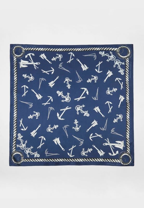 A neck silk scarf in a marine motif print. 