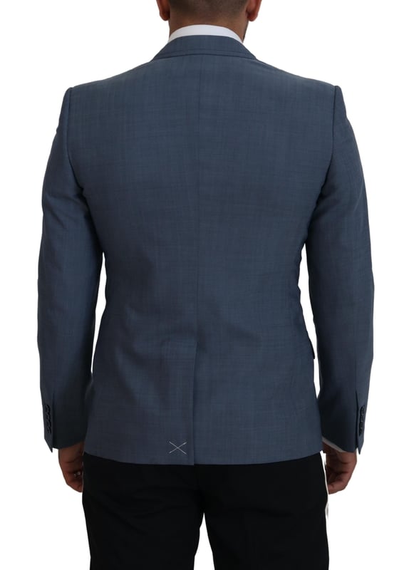 Absolutely stunning 100% Authentic brand new with tags Dolce & Gabbana blazer
  Single breasted style with a blue color and blue inner lining
  Two-button closure
  Logo details
  Made in Italy
  Material: 92% Wool 7% Elastane 1% Polyester
  Lining: 36% Cupro 33% Rayon 31% Acetate
Material: 92% Wool 7% Elastane 1% Polyester