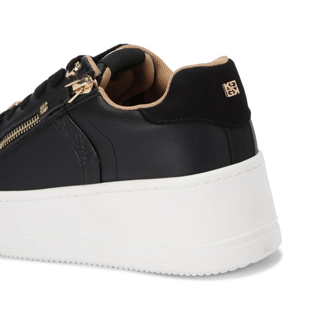This KG Kurt Geiger Lottie Lace Up sneaker arrives in black with wide laces and a gold zipper to one side. The hardware is gold and the chunky sole is in white.