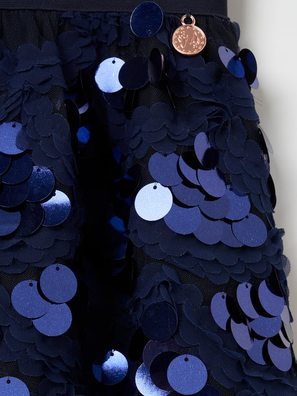 Behold the skirt of your dreams! Oversize sequins and intricate lace woven into a super voluminous skirt. Twirl into the party season like…. About Me: 100% Polyester. Model is 139cm and is wearing age 10. Look After Me: Think Planet. Wash At 30C.