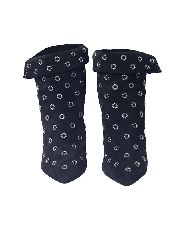 VINTAGE, RRP AS NEW
These black Isabel Marant Lakky 90 suede floral eyelet boots are all you need to make the perfect first impression, after all, according to a 1920 article published in Vogue: 'how expressive of character footwear is'. Crafted in Italy to exacting standards, these shoes have been fabricated from suede and feature a point toe, a silver-tone floral eyelet embellishment at the front, a rear circular eyelet embellishment, a fold-over top and a 90 mm wedge heel. 

Isabel Marant Lakky 90 Eyelet Boots in Black Suede
Color:   black
Size:  39
Material:   Suede
Condition: very good
Sign of wear: scuffed soles
SKU: 207279