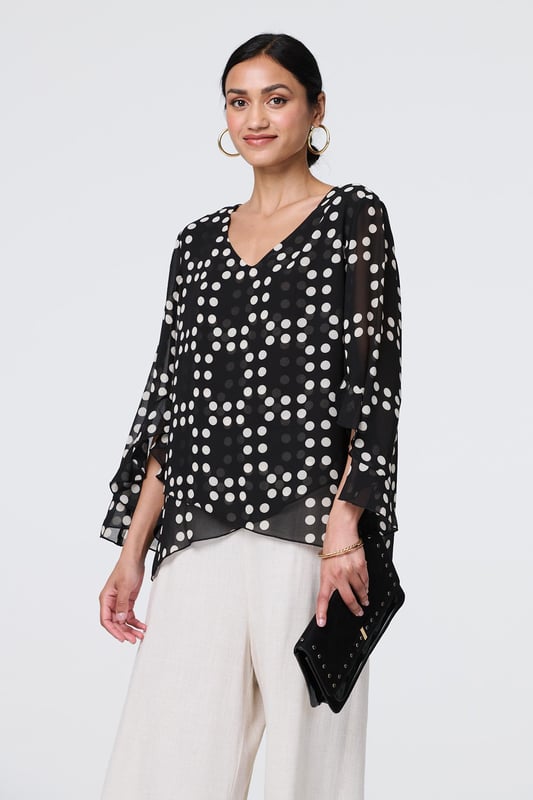 Get all of the style with none of the effort thanks to this blouse. It has a v-neck and 3/4 flared sleeves that will look timeless and elegant, whether you're wearing it for work or leisure. Plus, it has a semi sheer mesh layer and a modern curve hem for a unique finishing touch. Wear with smart trousers, a skirt or even jeans for a chic look.