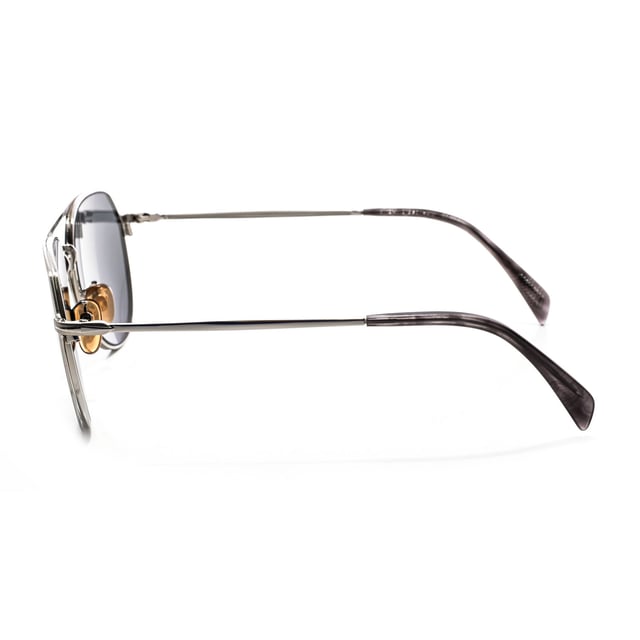 7095GS sunglasses with metal frame.

 Shape and design:
 - These David Beckham glasses have a round silhouette.

 Frame material:
 - The frame of these glasses is made of metal.
 - The use of metal provides durability and lightness to the frame.
 - This makes the glasses durable and comfortable to wear.

 Metal temples:
 - The temples are also made of metal, matching the frame material.
 - The metal on the temples adds solidity and stability to the structure of the glasses.

 Brand details:
 - David Beckham brand engraving on the lens.
 - These design elements help to clearly identify the model as part of the David Beckham eyewear collection.

 Glasses:
 - The lenses are of high quality.
 - These lenses provide excellent UV protection and sharp, clear vision.
 Measures: Lens height: 50 mm. Lens width: 58 mm. Bridge: 18 mm. Temples: 150 mm.
 Composition: Metal
 Care:
Use a soft, clean microfiber cloth to clean your sunglasses. This type of cloth will not scratch the lenses.
 Avoid using abrasive cleaning products, detergents, alcohol or acetone, as they can damage lenses and anti-reflective treatments.