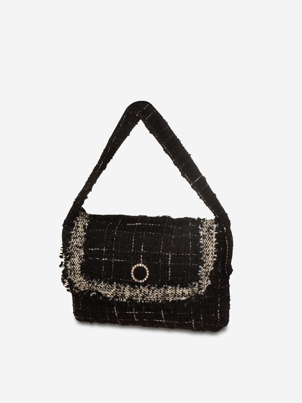 Patachou embody the finest high qualities this holiday season. This girls tweed handbag in black is reflective of the Portuguese label's passion for traditional abstracts. Made in a frayed tweed silhouette, it will be her favourite bag to show off this festive season.‚ Button Fastening‚ Shoulder Strap‚ Antiqued Hardware‚ Fabric: 100%