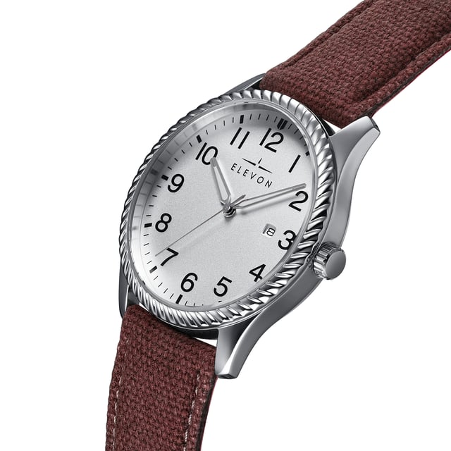 Polished Alloy Case
Japanese Seiko PC21 Quartz Movement
Non-Glare Scratch-Resistant Mineral Crystal
Logo-Engraved Stainless Steel Caseback
Canvas-Overlaid Genuine-Leather Strap
Logo-Engraved Stainless Steel Clasp
Luminous Hands
Date Display
42mm Case Diameter
5ATM Water Resistance
