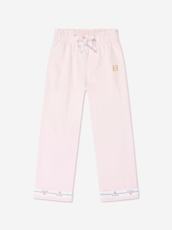German heritage luxury label Escada combine modern innovation with timeless elegance. This girls bright white t-shirt is a captivating construction. Envisioned in refined cotton with an elasticated gold glitter waistband and Escada printing. Made for comfort and style, she will be obsessed. Straight Hem  Escada Print Down Bottom Left Leg 95% Cotton, 5% Elastane