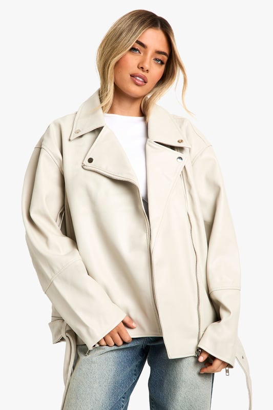 A short, close-fitting jacket complete with zips and stud detailing, rock some seriously cool vibes on the day-to-day with a biker jacket. Whether you prefer cropped, longline or a classic oversized shape for vintage vibes, biker jackets are a wardrobe classic that's perfect for edging up your outfit. Layer up your dress with a suede biker jacket, or show off your shape with a black biker jacket that's both timeless and flattering.Style: Faux Leather JacketFabric: Faux LeatherLength: LonglineSleeve Length: Long Sleeve