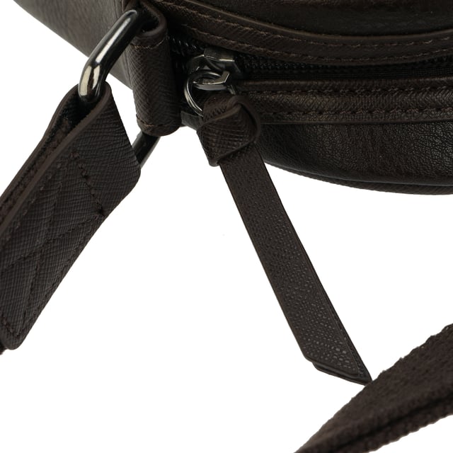 Mens Ted Baker Evver Striped PU Flight Bag in brown.- Adjustable shoulder strap.- Zip fastening.- Stripe detailing.- Ted Baker debossed detail.- Ted Baker-branded.- Shell: 100% Polyurethane. Lining: 100% Polyester.- Ref: 256435BRNCHOC