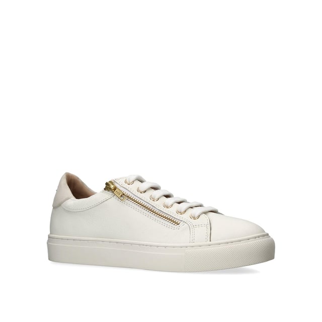 KGL Dulwich Zip from Kurt Geiger London is a low top, lace up trainer with a white upper featuring a gold zip.