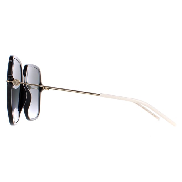 Las gafas de sol Gucci GG1267S 001 negro brillante y gris dorado degradado son un accesorio atrevido y a la moda que hará una declaración allá donde vayas. Estas gafas de sol presentan un exclusivo diseño de montura cuadrada fabricada con una ligera montura de acetato. El emblemático logotipo de Gucci destaca en las patillas, añadiendo un toque de lujo a este diseño ya de por sí sofisticado. Ya estés haciendo recados, tumbada en la playa o vistiéndote para salir por la noche, estas gafas de sol Gucci GG1267S te ayudarán a destacar entre la multitud.