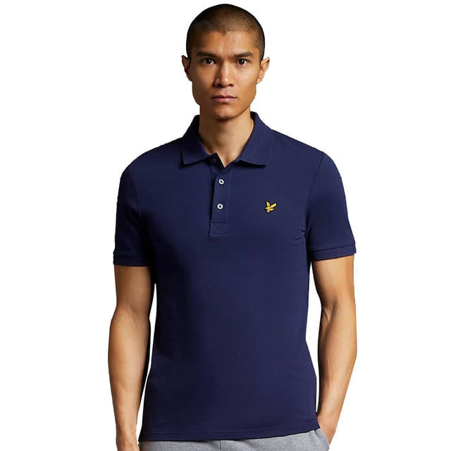 The ultimate Lyle & Scott style icon, our Plain Polo Shirt has a been at the forefront of fashion for decades. Available in an array of colours and constructed from a lightweight, soft cotton-blend, our polos are a wardrobe essential. Imbued with elastane so added stretch and finished with classic ribbed collar and cuffs, three-button placket with detail stitching, plus our signature Golden Eagle, a mark of true British heritage. 
 
Fit: Regular
It is crafted to fit the body neither too tightly or too loosely, leaving you with a classic, timelessly stylish look. We recommend you order your usual size, but if you're caught between two, go a size up.