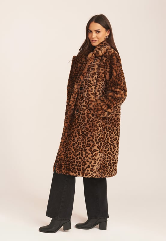 Introducing to you all a new look leopard print faux fur long line coat in navy color which is very soft, cuddly and light weighted at the same time. It has large collar detail, fully line two pockets with botton style fastening. Get ready for this winter and style with this super fluffy and comfortable fur jacket.