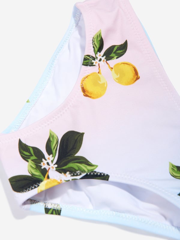 Introducing the 'Girls Ira Lemon Print Bikini' in Multicolour ‚Äì this season's must-have from Nessi Byrd. Perfectly designed for girls who make a splash at Swim. Let's dive into its enticing features: Vibrant Print: The delightful lemon print emanates a lively feel, making every Swim occasion a stylish affair. Luxurious Comfort: Crafted with superior quality fabric for your girl's utmost comfort, ensuring smooth sailing in every aquatic adventure. Wardrobe Revamp: Elevate your little one's swimwear collection with this playful bikini. Amplify the fun quotient with the charismatic 'Girls Ira Lemon Print Bikini' in Multicolour. Sparkle her Swim with Nessi Byrd's style!