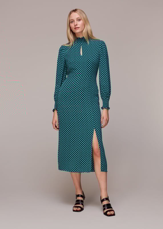 Elevate weekend style with this Star Check Print Midi Dress, perfect for going out. The long-sleeved, green and multicolor design offers a playful yet refined look. Crafted from 100% viscose, it promises ease and comfort without compromising on elegance. Ideal for the fashion-forward individual seeking a blend of casual charm and sophistication.