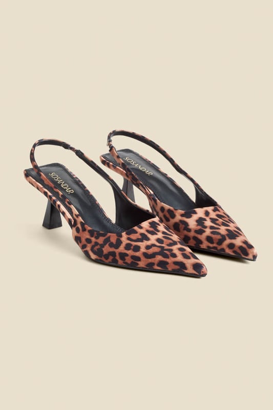 We're obsessed with them too Crafted from luxe crinkle leather in a stunning cherry red patent finishChic slingback with an elasticated insert for a comfortable fit Sexy pointed toe silhouetteSet on a super-wearable flared kitten heel We love them with jeans and a blazer