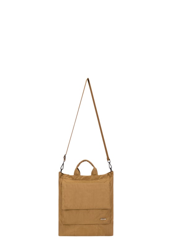 Made from our signature nylon, the Portrait Nylon Tote is the perfect way to carry all your everyday essentials. Featuring a padded carry handle and adjustable crossbody strap with a clip off function. Features: , Zip top opening, Front oversized flap over zip pocket, Rear zip pocket, SMITH & CANOVA antique brass logo, Branded antique brass zips, Padded grab handle, Adjustable crossbody strap (detachable), Internal 15 inch padded laptop sleeve, Internal zip pocket, 2 Internal mobile phone slip pockets - fits normal and plus size smart phones, 2 Internal pen slip pockets Style Ref: 92682 TAN