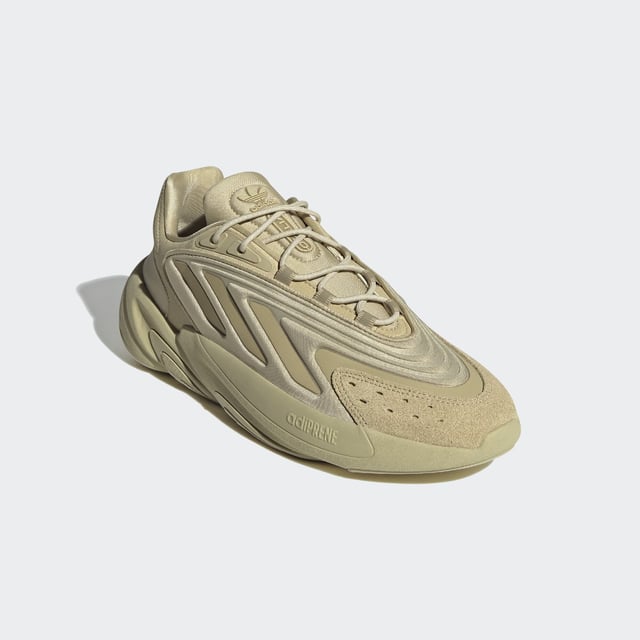 adidas may be a long way from the '90s, but these Ozelia Shoes are rooted in that loud, experimental era. Inspired by the adidas archives, the bold trainers have a chunky build that's all about being noticed. They're sleek with a fast look, and when your days are fast-paced, the Adiprene cushioning helps out on the comfort side of things.This product is made with recycled content as part of adidas' ambition to end plastic waste. 20% of pieces used to make the upper are made with minimum 50% recycled content.  - Snug fit - Lace closure - Textile upper - Hugs the foot - Adiprene cushioning - Rubber outsole - 25% of the components used to make the upper are made with a minimum of 50% recycled content  Shipped by adidas