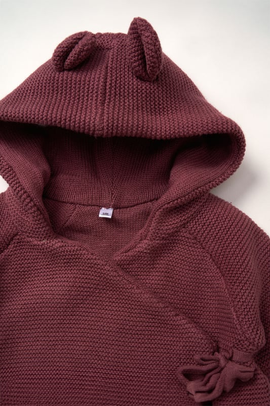 Homegrown's organic cotton hooded wrap cardigan is crafted for comfort and sustainability. Featuring tie fastening and cute bear ears on the hood, this cosy, breathable cardigan is gentle on delicate skin and perfect for any season.