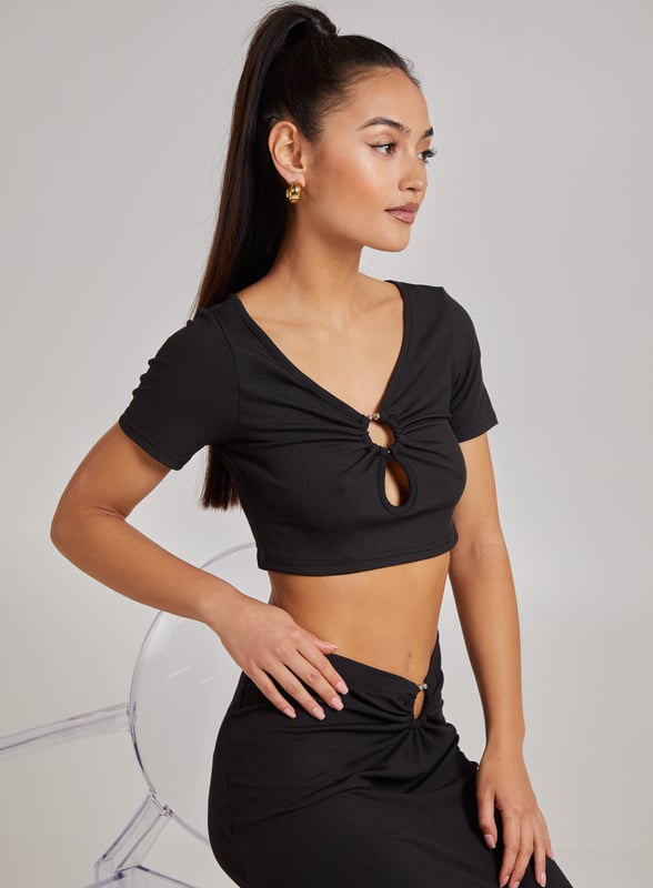 The perfect weekend combo! Match this ring detailed ribbed top with our ring detailed ribbed skirt for a look to love this season!